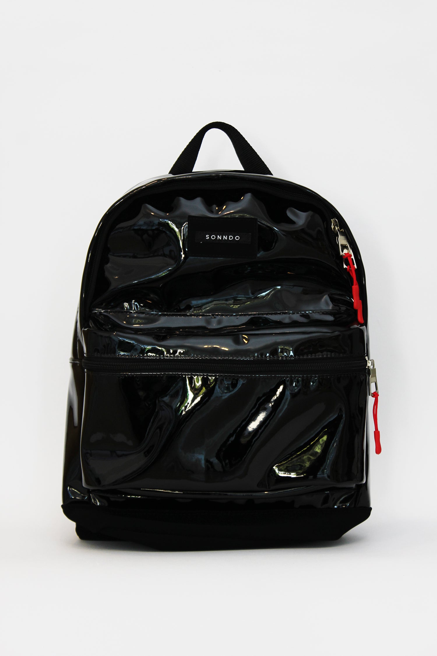 Mochila negra charol